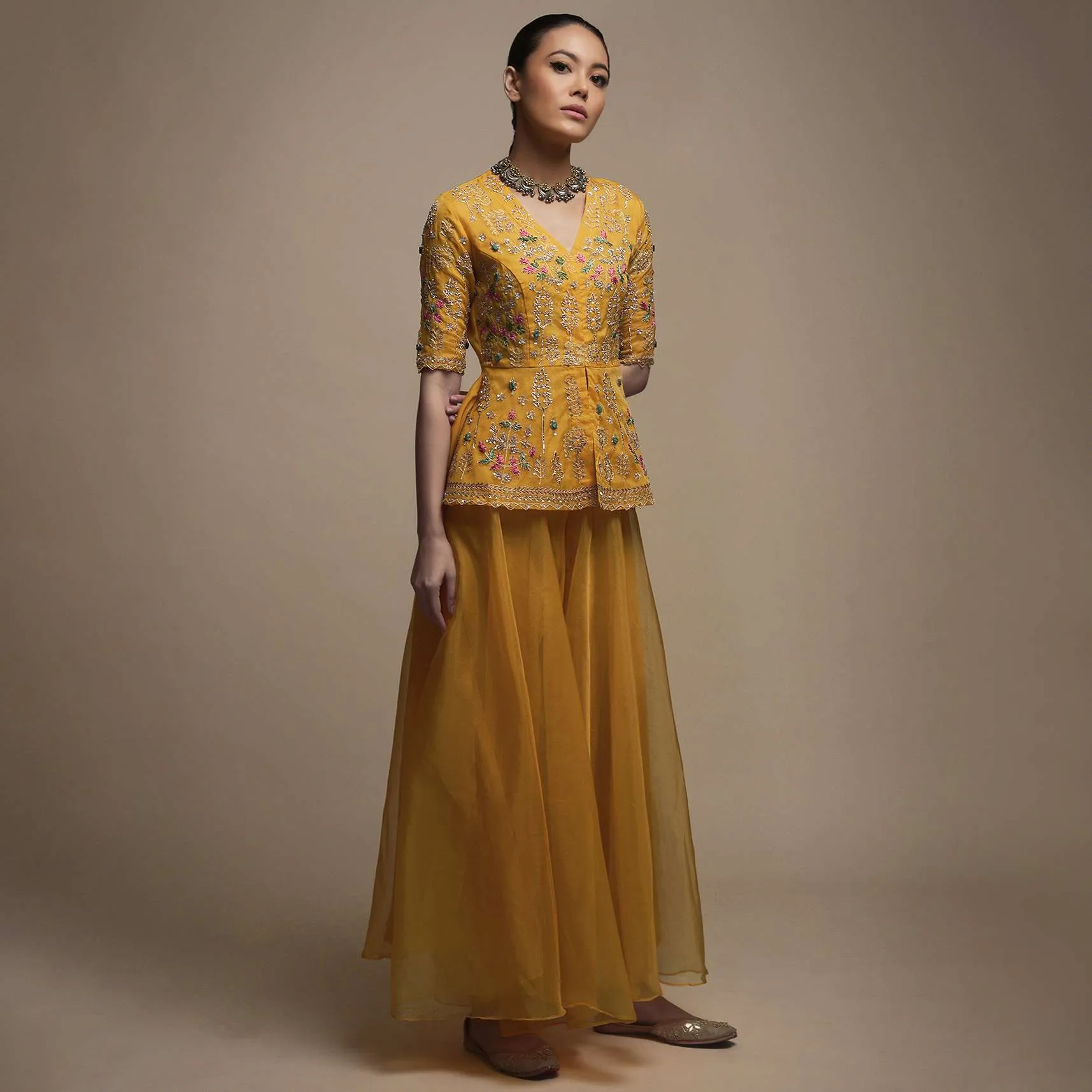 Dark Amber Yellow Palazzo Suit In Organza With Matching Peplum Top Adorned In Zari And Thread Work