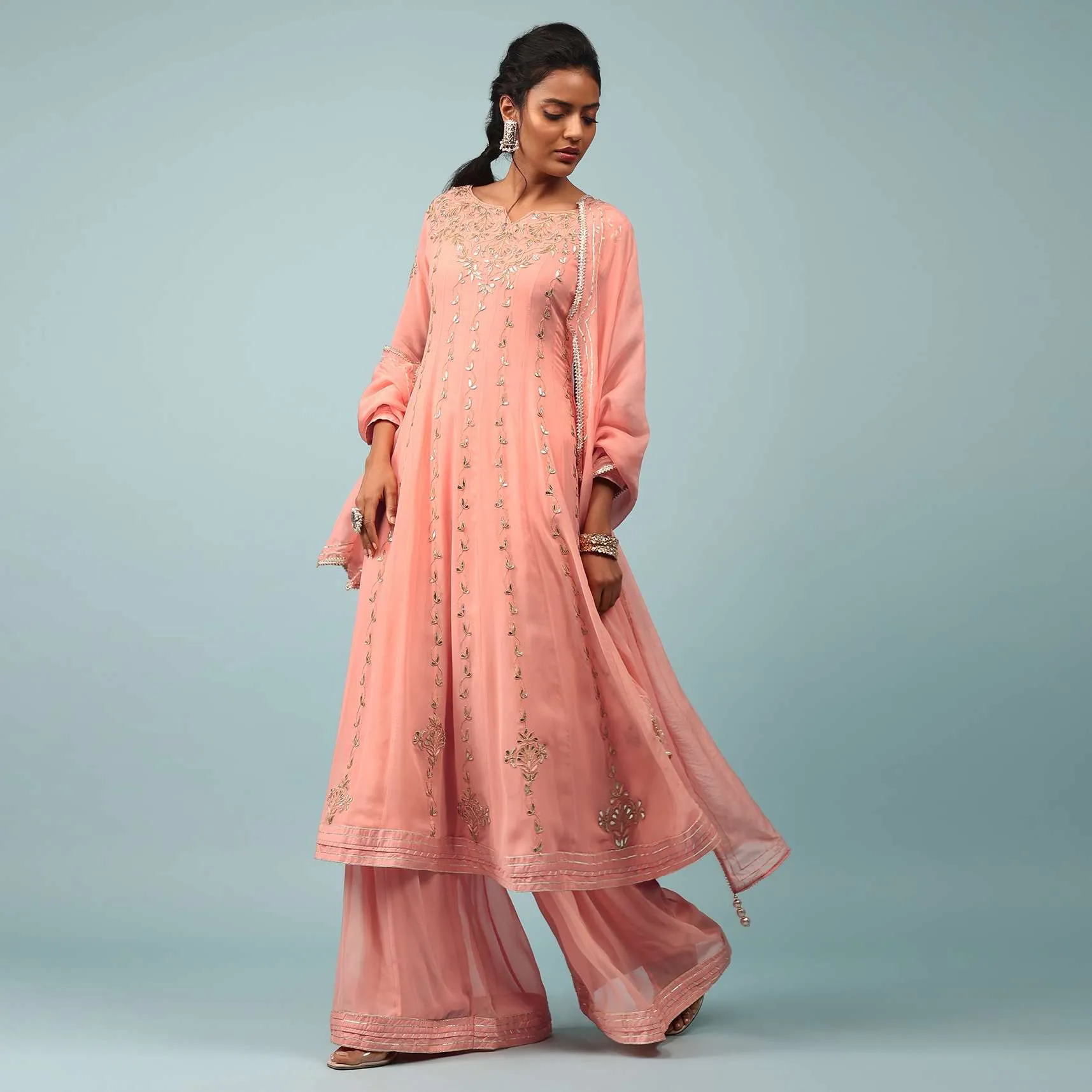 Peach Amber Embroidered Palazzo Suit In Georgette